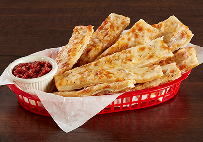 Order GARLIC STICKS WITH CHEESE food online from Mountain Mike's Pizza store, Newman on bringmethat.com